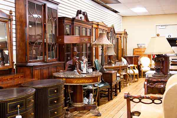 Showroom full of antique furniture