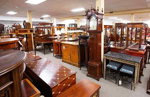 Showroom full of antique furniture