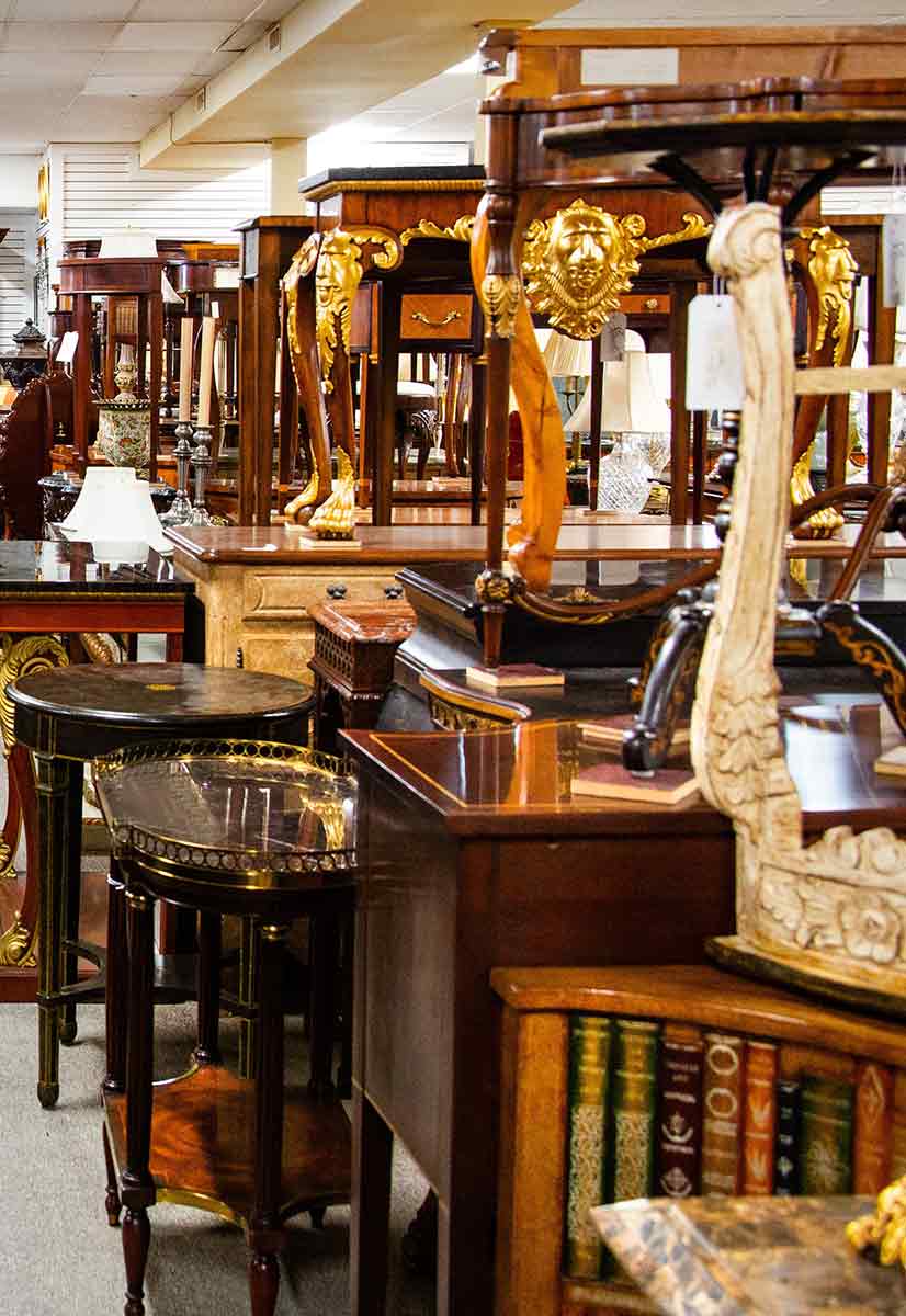 Showroom full of antique furniture